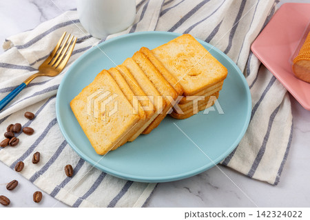 stack of Seasoned Crispy Baked Bread Toast stack of Seasoned Crispy Baked Bread Toast 142324022