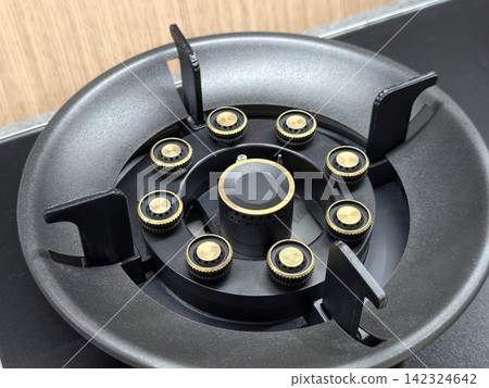 Close-up of modern black gas stove burner ring 142324642