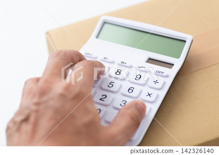 Cardboard and calculator Cardboard and calculator 142326140