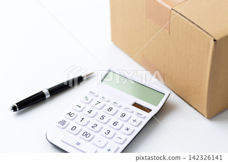 Cardboard and calculator Cardboard and calculator 142326141