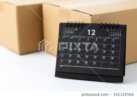 Cardboard and a December calendar Cardboard and a December calendar 142326568