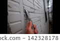 Exterior wall painting 142328178