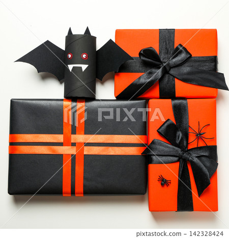 Halloween. Colorful gift boxes are beautifully wrapped for Halloween Halloween. Colorful gift boxes are beautifully wrapped for Halloween 142328424