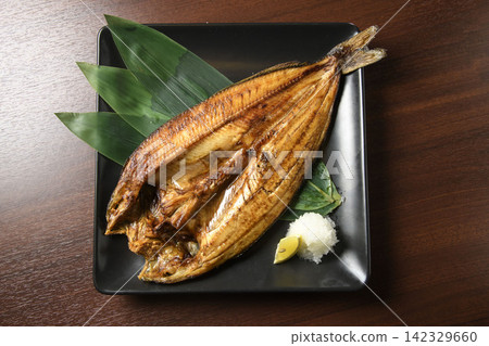 Charcoal-grilled Atka mackerel from Hokkaido, a premium fish dish grilled to perfection. Charcoal-grilled Atka mackerel from Hokkaido, a premium fish dish grilled to perfection. 142329660