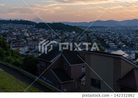 Evening view of a residential area in the suburbs of Hino City, Tokyo. Evening view of a residential area in the suburbs of Hino City, Tokyo. 142332862