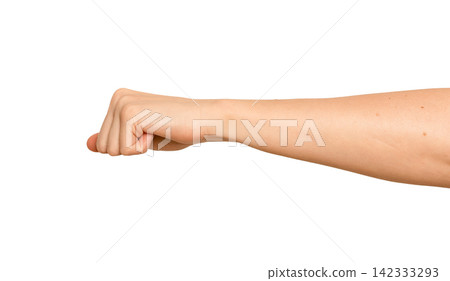 Female fist shown from side view, pinky visible. Gesture resembles a fist bump or casual greeting Female fist shown from side view, pinky visible. Gesture resembles a fist bump or casual greeting 142333293