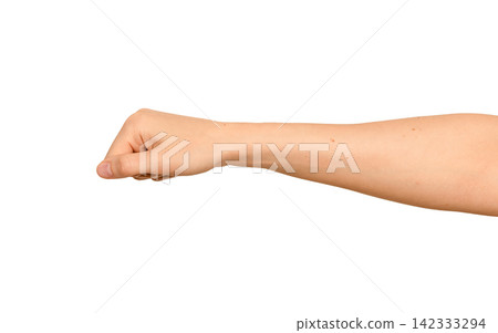Female fist shown from side view, thumb visible. Gesture resembles a fist bump or casual greeting Female fist shown from side view, thumb visible. Gesture resembles a fist bump or casual greeting 142333294
