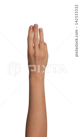 Female hand raises three fingers upward in a row. Gesture suggests counting or showing the number Female hand raises three fingers upward in a row. Gesture suggests counting or showing the number 142333332