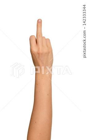 Female hand thrusts middle finger straight at camera. Gesture reads as defiant and confrontational Female hand thrusts middle finger straight at camera. Gesture reads as defiant and confrontational 142333344
