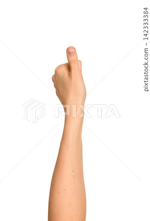 Female left thumb presses as if verifying a fingerprint. Gesture resembles Touch ID scan or a Female left thumb presses as if verifying a fingerprint. Gesture resembles Touch ID scan or a 142333384