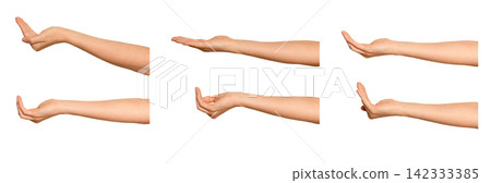 Female palm curves upward cradling an unseen item, side view. Fingers gently close around something Female palm curves upward cradling an unseen item, side view. Fingers gently close around something 142333385