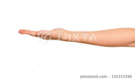 Female palm faces upward presenting something unseen. Fingers stay relaxed as if displaying an Female palm faces upward presenting something unseen. Fingers stay relaxed as if displaying an 142333386