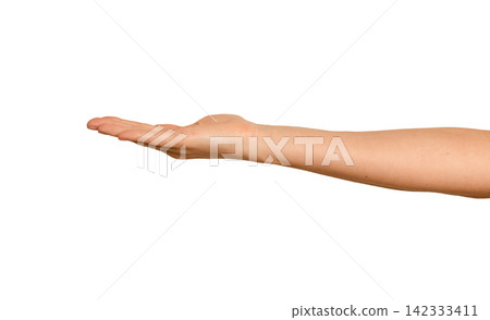 Female right hand holds something invisible on its palm. Side view shows fingers relaxed around an Female right hand holds something invisible on its palm. Side view shows fingers relaxed around an 142333411
