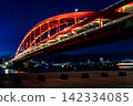 Kobe Bridge at night, the harbor illuminated in red. 142334085