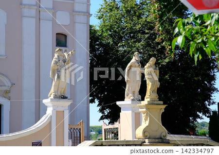Historic Saint Josaphat Church and Baroque Sculptures in Kamianets Podilskyi Ukraine Historic Saint Josaphat Church and Baroque Sculptures in Kamianets Podilskyi Ukraine 142334797