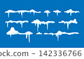 Snow caps set. White snow caps, snowdrifts, snow pile and icicles isolated on blue. Snowy elements on winter background. Winter elements decorations 142336766