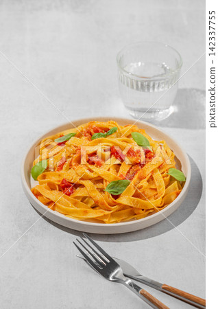 Homemade Tagliatelle Pasta with Tomato Sauce, Basil and Parmesan Homemade Tagliatelle Pasta with Tomato Sauce, Basil and Parmesan 142337755