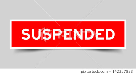 Red color square shape sticker label with word suspended on gray background Red color square shape sticker label with word suspended on gray background 142337858