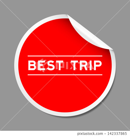 Red color peel sticker label with word best trip on gray background Red color peel sticker label with word best trip on gray background 142337865