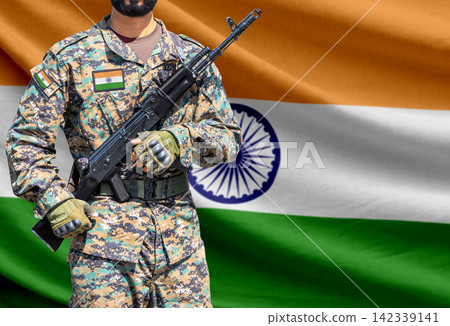 India flag with soldier holding assault rifle India flag with soldier holding assault rifle 142339141