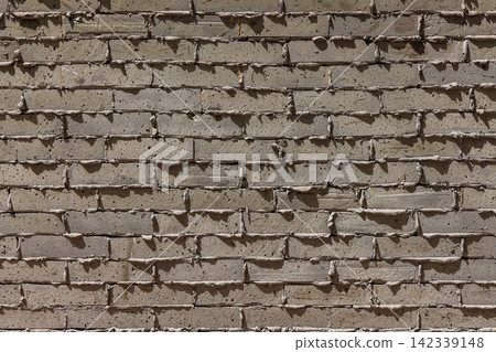 Close-Up of Textured Brick Wall with Mortar Close-Up of Textured Brick Wall with Mortar 142339148
