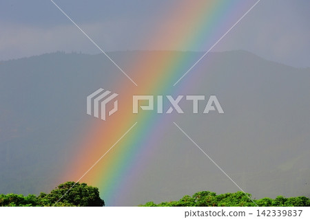 A rainbow on the mountain A rainbow on the mountain 142339837