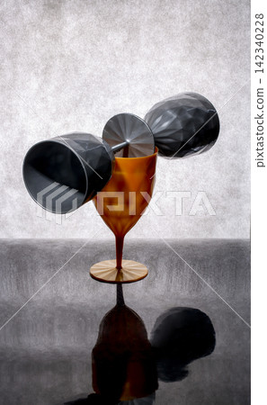 Still life with glasses on a colored background Still life with glasses on a colored background 142340228