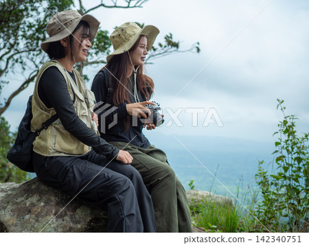tourist with backpack hiking in forest tourist with backpack hiking in forest 142340751