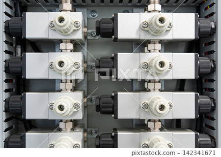 Industrial pneumatic manifold system with multiple solenoid valves and connectors Industrial pneumatic manifold system with multiple solenoid valves and connectors 142341671