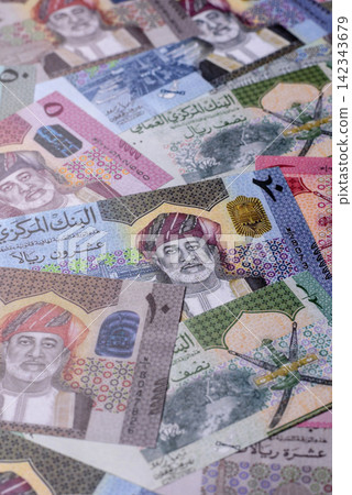 Oman, omani paper money, rial or riyal banknotes and coins as currency for exchange. Omani money Oman, omani paper money, rial or riyal banknotes and coins as currency for exchange. Omani money 142343679