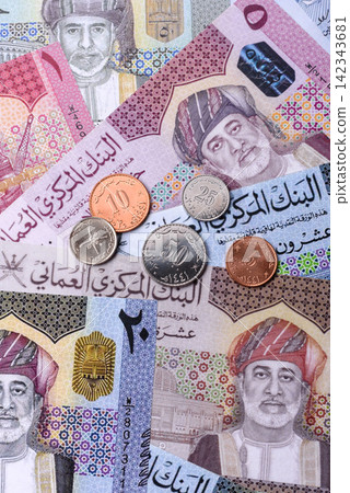 Oman, omani paper money, rial or riyal banknotes and coins as currency for exchange. Omani money Oman, omani paper money, rial or riyal banknotes and coins as currency for exchange. Omani money 142343681
