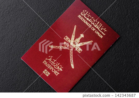 Oman, omani passport for travelling, flying and doing business. Omani document, id Oman, omani passport for travelling, flying and doing business. Omani document, id 142343687