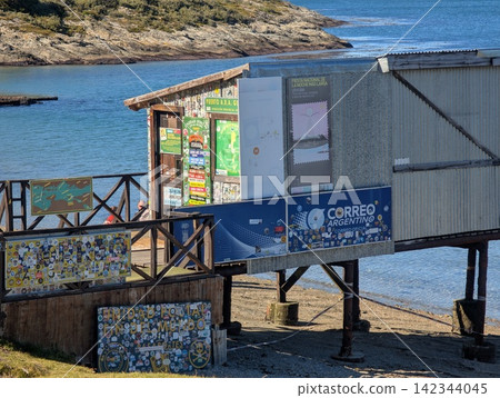 Ushuaia, Tierra del Fuego, Argentina - March 7, 2026: Fin del Mundo postal hut beside the Beagle Channel. Ushuaia, Tierra del Fuego, Argentina - March 7, 2026: Fin del Mundo postal hut beside the Beagle Channel. 142344045