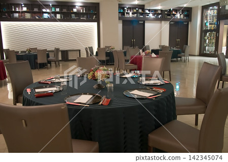 Table setting in the banquet hall Table setting in the banquet hall 142345074