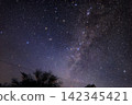 Winter starry sky: The setting constellations Cassiopeia and Andromeda 142345421