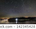 Winter starry sky over the Seto Inland Sea: The setting constellations Cassiopeia and Andromeda, and their constellation lines. 142345428