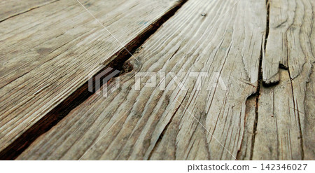 Weathered wood planks with deep crevices and natural grain. Weathered wood planks with deep crevices and natural grain. 142346027