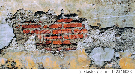 A damaged wall texture featuring exposed red brick and peeling plaster. A damaged wall texture featuring exposed red brick and peeling plaster. 142346028