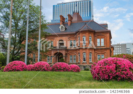 The former Hokkaido Government Office, a nationally important cultural property, stands in the lush green front garden of Chuo Ward, Sapporo City, Hokkaido, Japan. The former Hokkaido Government Office, a nationally important cultural property, stands in the lush green front garden of Chuo Ward, Sapporo City, Hokkaido, Japan. 142346366