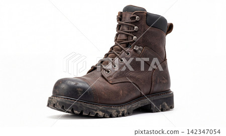 Brown leather work boot with laces isolated on white background footwear construction industrial protection isolated background contractor tradesman carpenter electrician mechanic trekking Brown leather work boot with laces isolated on white background footwear construction industrial protection isolated background contractor tradesman carpenter electrician mechanic trekking 142347054