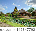 A traditional gazebo and a beautiful lotus pond at Taman Ayun Temple, a World Heritage Site in Bali. 142347792