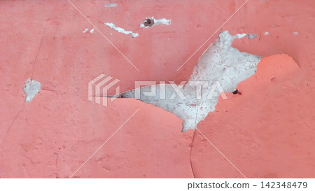 Peeling and weathered red paint on concrete surface. Peeling and weathered red paint on concrete surface. 142348479
