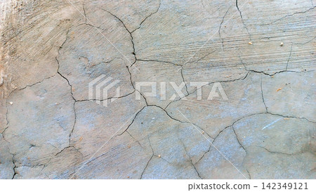 Cracks on the surface of weathered cement. 142349121