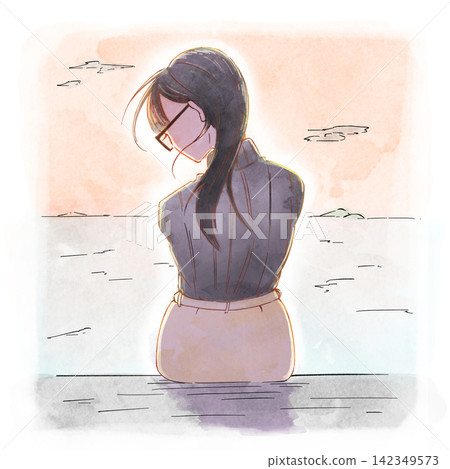 A woman's back as she sits against the backdrop of a sunset. A woman's back as she sits against the backdrop of a sunset. 142349573