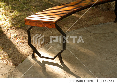 wooden bench in the park 142350733
