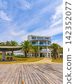 Summer blue sky, crystal-clear sea, and resort scenery. 142352077