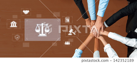 Collaborative Work on Legal Concepts with Hands Overlaid on Digital Icons Representing Justice, Agreement, Law, and Governance in a Professional Setting Trope Collaborative Work on Legal Concepts with Hands Overlaid on Digital Icons Representing Justice, Agreement, Law, and Governance in a Professional Setting Trope 142352189