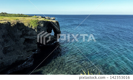 The stunning views of the cliffs and East China Sea from Cape Zanpa, a scenic spot in Yomitan Village, Okinawa. The stunning views of the cliffs and East China Sea from Cape Zanpa, a scenic spot in Yomitan Village, Okinawa. 142353016