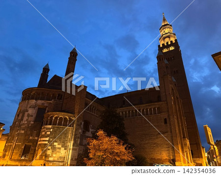 The cathedral and bell tower illuminated at night The cathedral and bell tower illuminated at night 142354036