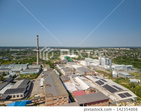 Panoramic high angle view of big industrial manufacturing facility and processing plant Panoramic high angle view of big industrial manufacturing facility and processing plant 142354808